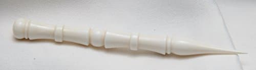 Cow bone 4-1/8" long needlepoint laying tool, wand or hair ornament. Turned by hand. Unique