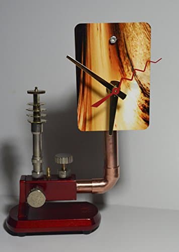 Futuristic recycled desk clock created using a dental lab Bunsen burner