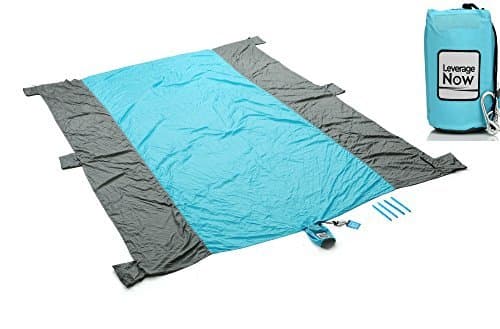 Beach Blanket - Sand Proof 10 Feet X 7.5 Feet - Perfect for Picnics, Camping, Outdoors, Kids Play Mat, Includes Zippered Pocket, Compact Storage Bag, 6 Sand Pockets, Nylon Parasheet,