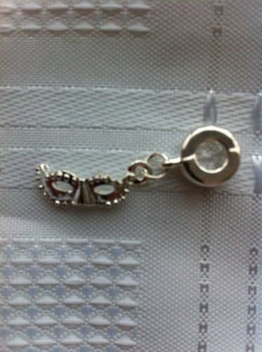 Divine Beads: Silver plated masquerade ball mask dangle charm. Will fit Pandora, Biagi, Tedora, Chamilia, Bacio, Troll and other European style charms &amp; beads bracelets. All orders from Divine Beads receive a free gift as a thank you