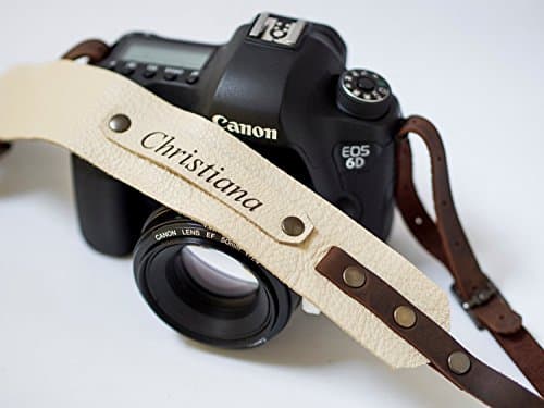 Personalized camera strap made from leather, perfect gift for photographer.