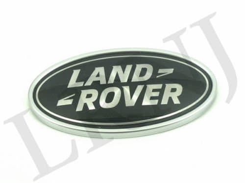 LAND ROVER DEFENDER FRONT KBX GRILLE BADGE GENUINE WIDTH 91MM x HEIGHT 48MM PART: LR060140