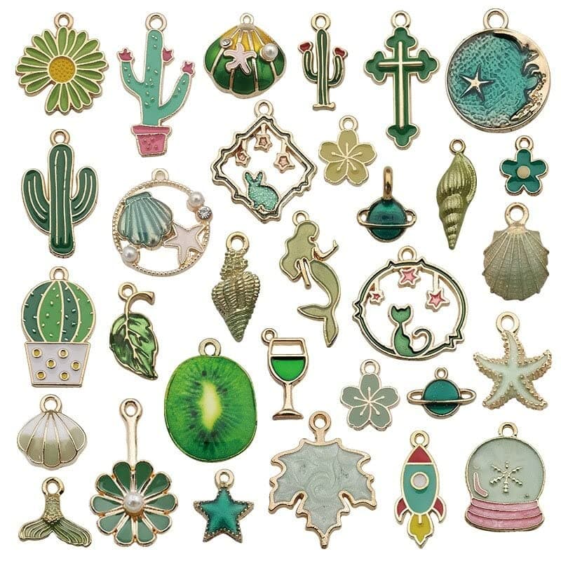 - Street27® 1 Set 31pcs DIY Mixed Assorted Gold Plated Enamel Charm Unicorn Flower Dress Fish Shell Moon Star Animals Pendant DIY for Necklace Bracelet Jewelry Making and Crafting Charms