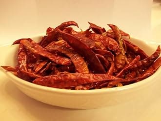 CAYENNE PEPPER, DIRED, the peppers could come whole or chopped depending on availability, no guarantees . .5 OZ, (1/2 ounce) DELICIOUS FRESH SPICY DRIED HERB