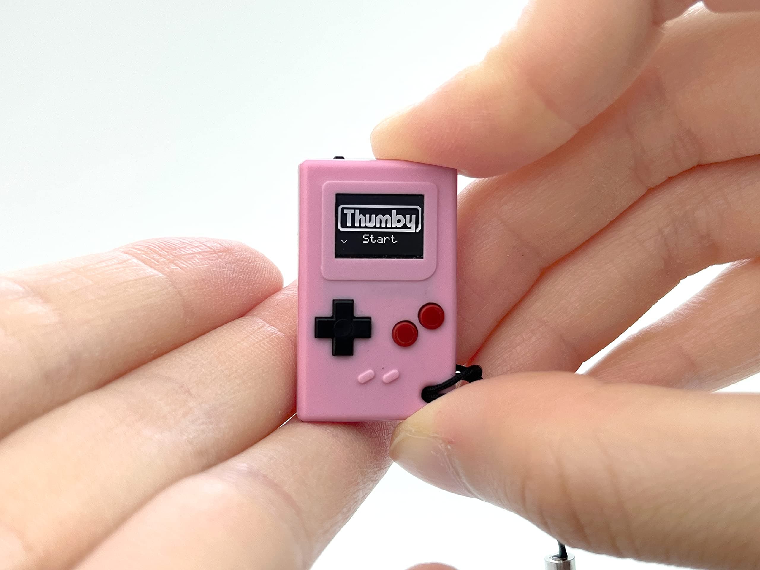 TinyCircuits Thumby (Pink), Tiny Game Console, Playable Programmable Keychain: Electronic Miniature, STEM Learning Tool (ASK4003-M)