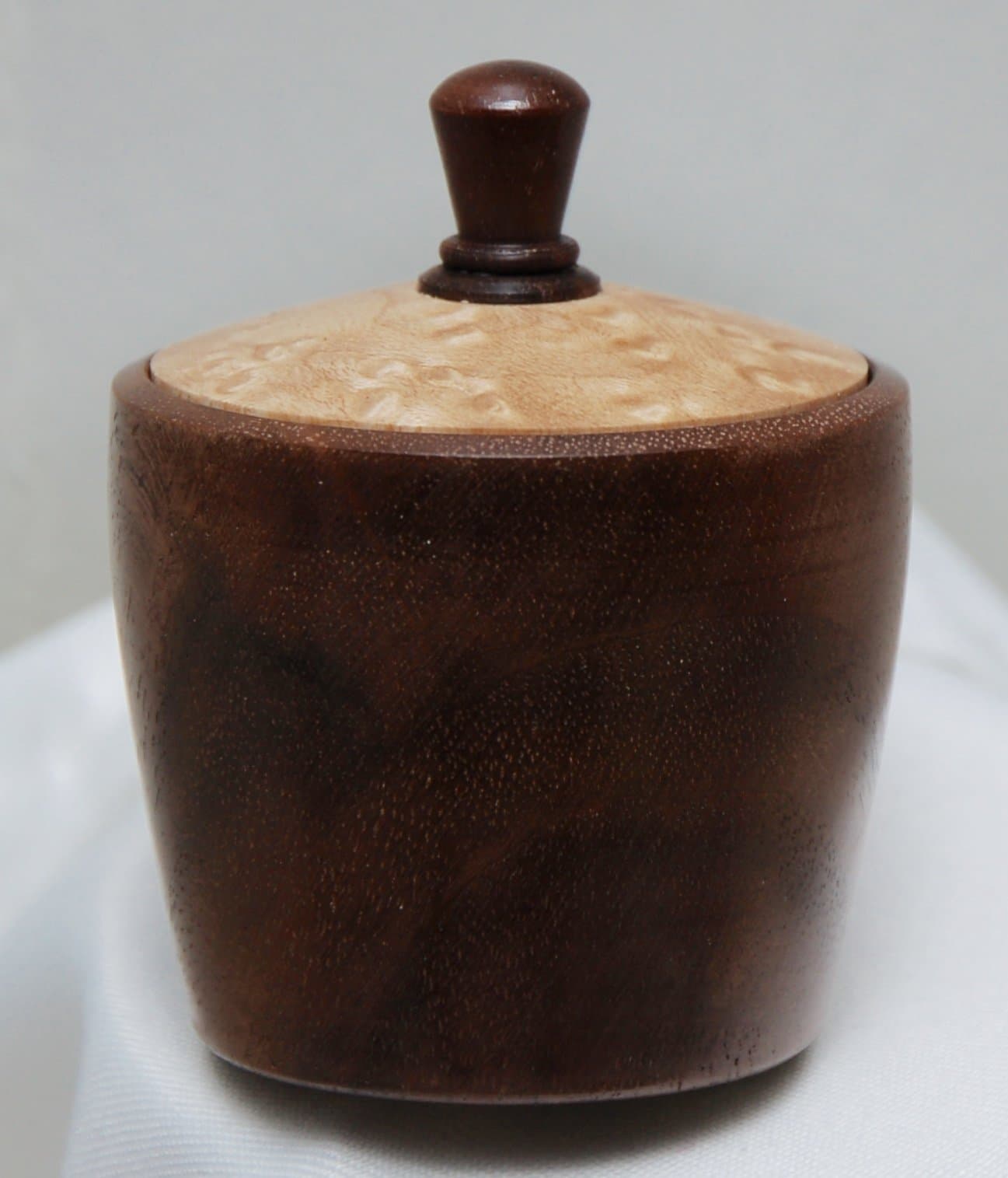 Walnut Wood lidded box. Handmade wood turning from walnut with bird's eye maple lid