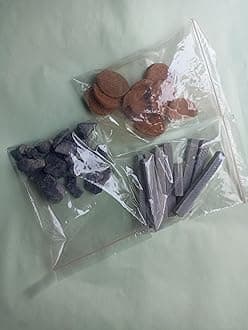A pack of 500 gms(black slate pencil, full roasted nakumatt, punjabi mitti buiscuits)
