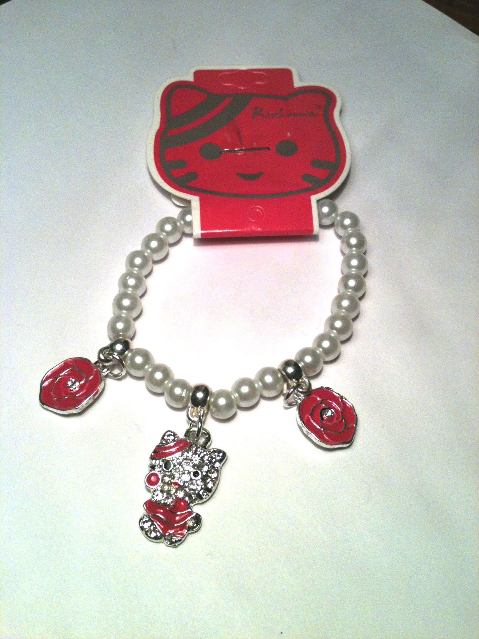 Cmagic Hello Kitty ® Hello Kitty Rhinestone Bracelet with Beads and Charms-Pink