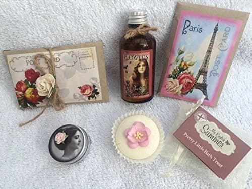 Paris Romance Bath Treat Selection - 1 Postcards from Paris Bath Milk, 1 Soothing Lavender Bath Milk, 1 Pretty Little Bath Melt, 1 Bottle of Floral Cleansing Bath Foam, 1 Lip Balm