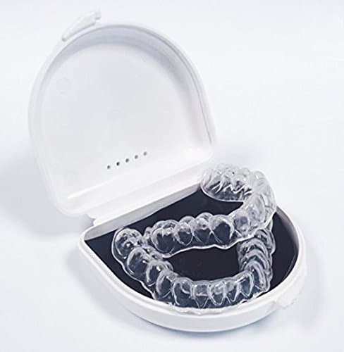1 complete set of retainers or custom teeth whitening trays including case