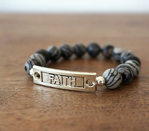Religious Stretch Bracelet featuring Black and White Silk Stone Gemstone Beads and a silver or brass faith link
