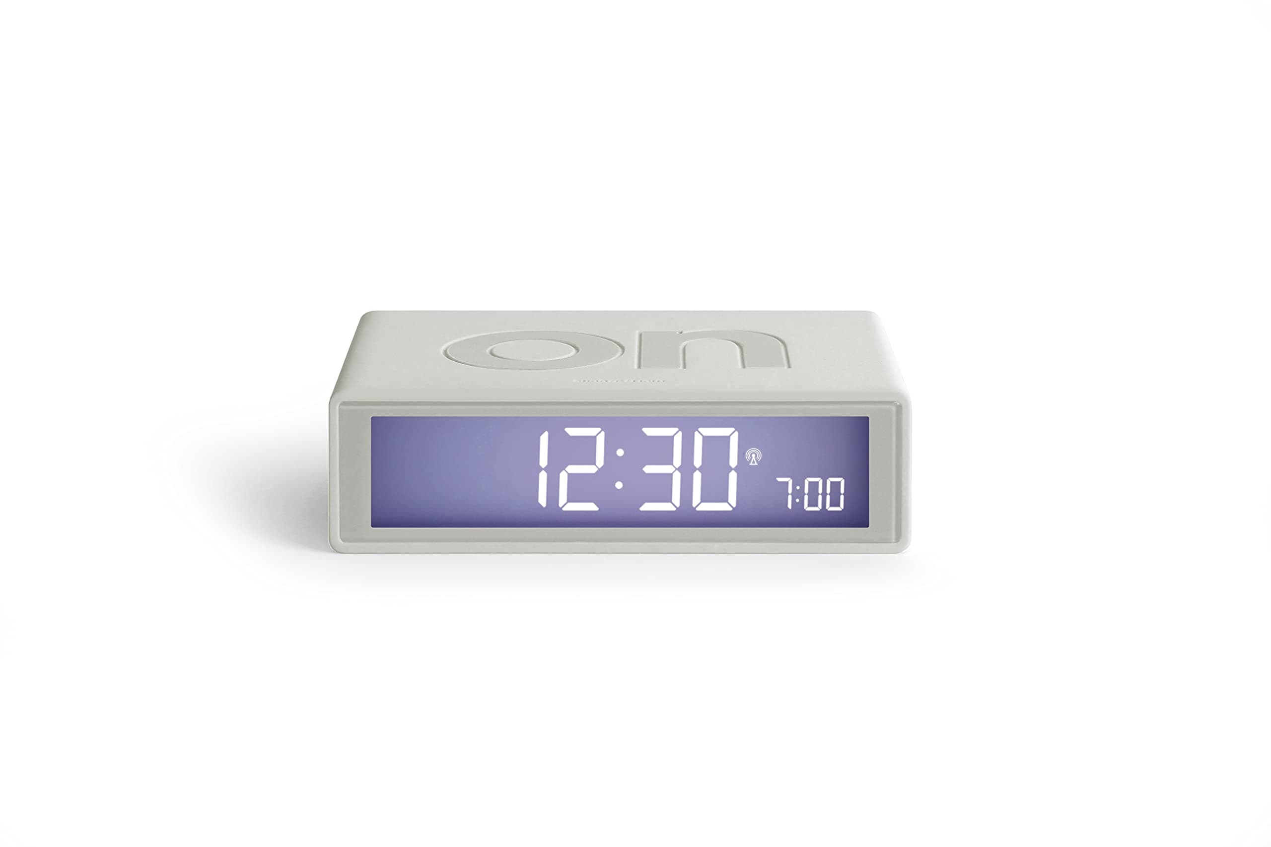 Lexon Flip+ Digital Alarm Clock for bedrooms, Reversible On/Off Faces with Snooze Function, LCD Display & Touch Sensor Light, Battery Operated, Rubber - White