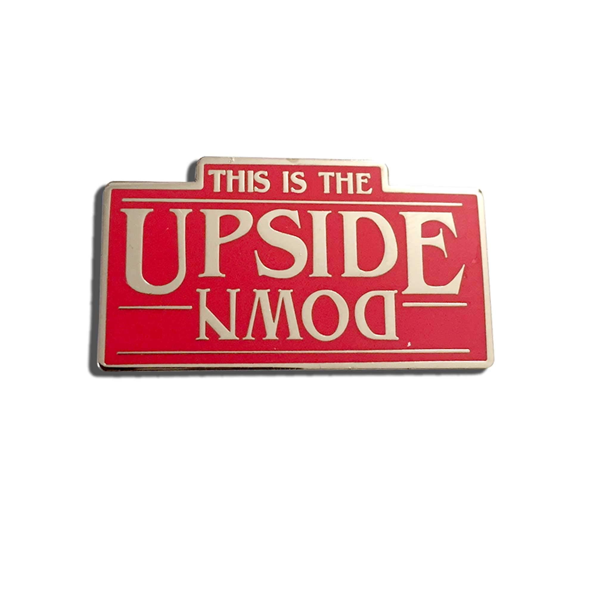This is The Upside Down Lapel/Enamel Pin, Red and Silver