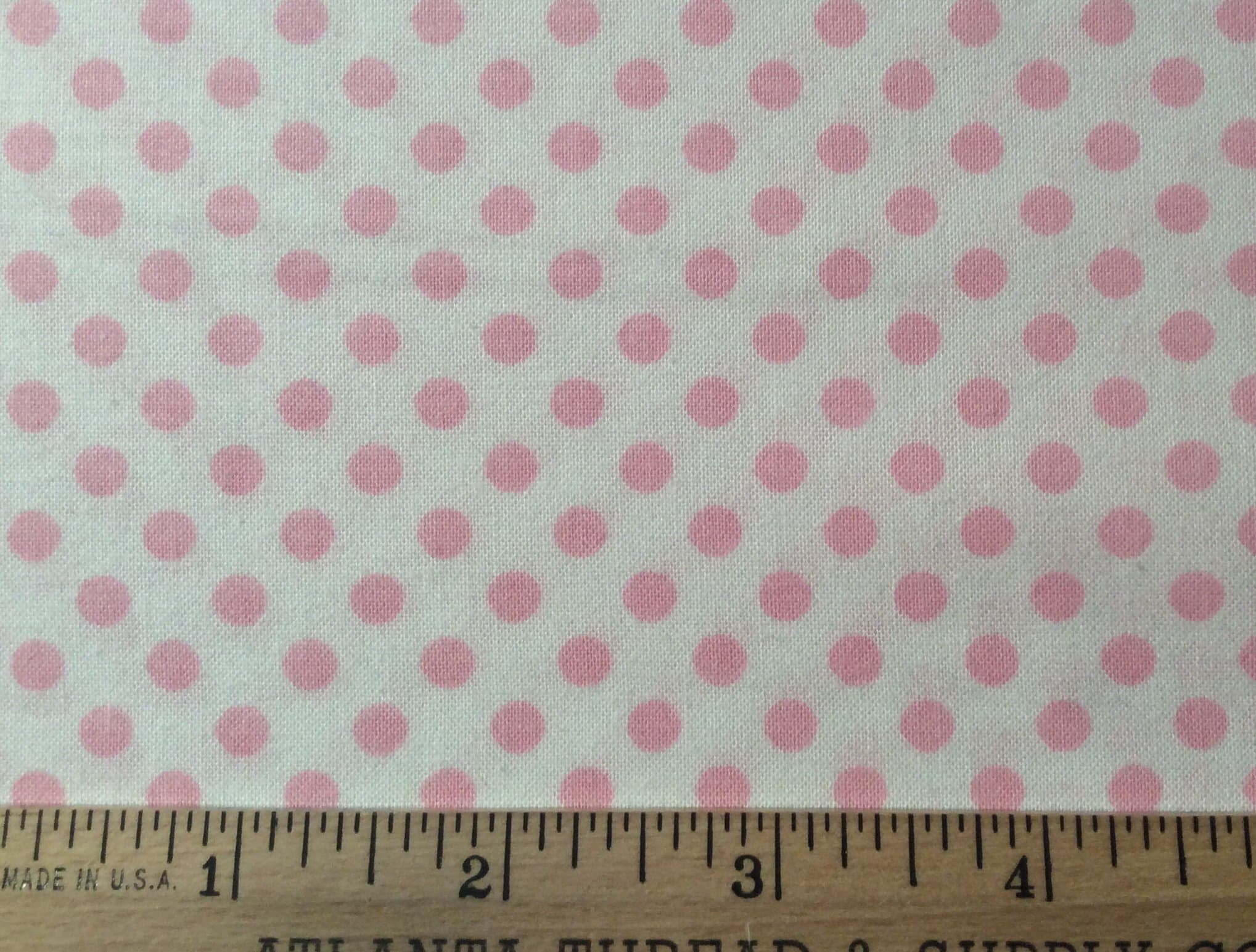 Lots-A-Dots Cotton Fabric by the yard. (Pos. pink sm. polka dot)